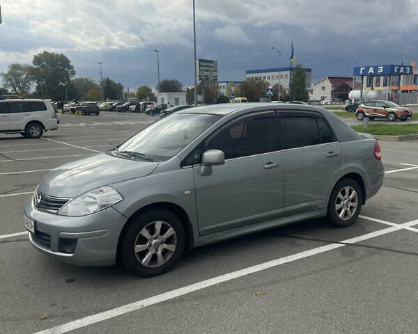 Серый Ниссан Тиида, объемом двигателя 1.6 л и пробегом 159 тыс. км за 6800 $, фото 1 на Automoto.ua