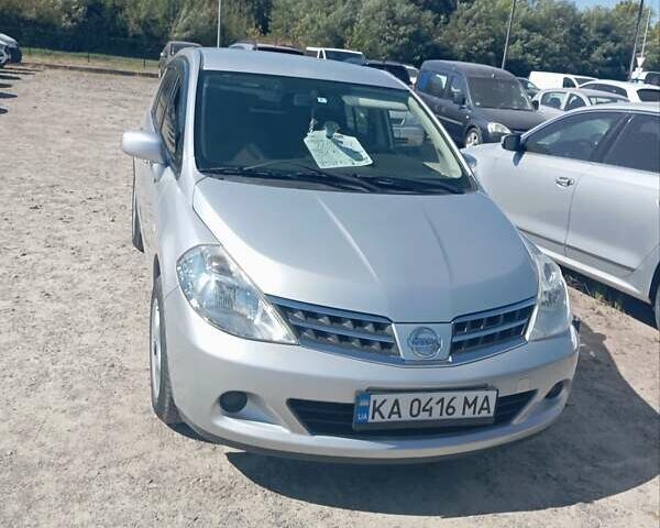 Серый Ниссан Тиида, объемом двигателя 1.5 л и пробегом 71 тыс. км за 6817 $, фото 1 на Automoto.ua