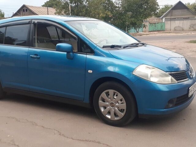Синий Ниссан Тиида, объемом двигателя 1.6 л и пробегом 260 тыс. км за 5700 $, фото 1 на Automoto.ua