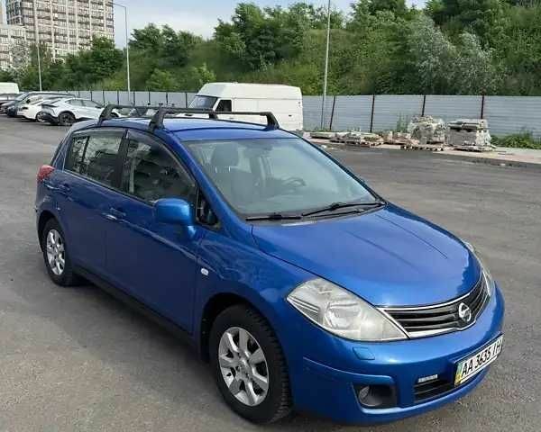 Синий Ниссан Тиида, объемом двигателя 1.6 л и пробегом 290 тыс. км за 5555 $, фото 1 на Automoto.ua