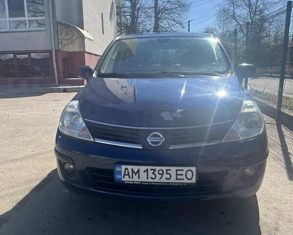 Синий Ниссан Тиида, объемом двигателя 1.6 л и пробегом 230 тыс. км за 5600 $, фото 1 на Automoto.ua
