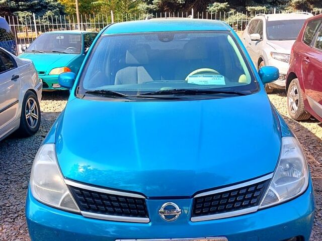 Зеленый Ниссан Тиида, объемом двигателя 1.6 л и пробегом 184 тыс. км за 6000 $, фото 1 на Automoto.ua