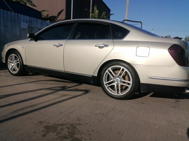 Бежевий Ніссан Теана, об'ємом двигуна 3.5 л та пробігом 240 тис. км за 4700 $, фото 1 на Automoto.ua