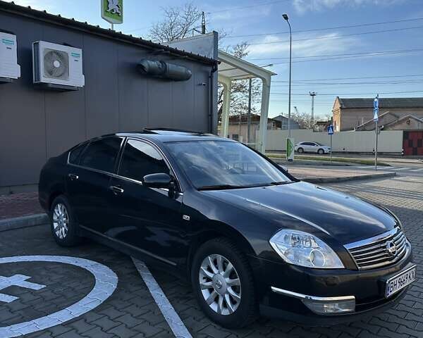 Черный Ниссан Теана, объемом двигателя 2.3 л и пробегом 235 тыс. км за 6600 $, фото 1 на Automoto.ua