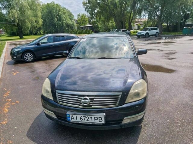 Черный Ниссан Теана, объемом двигателя 3.5 л и пробегом 240 тыс. км за 4500 $, фото 1 на Automoto.ua