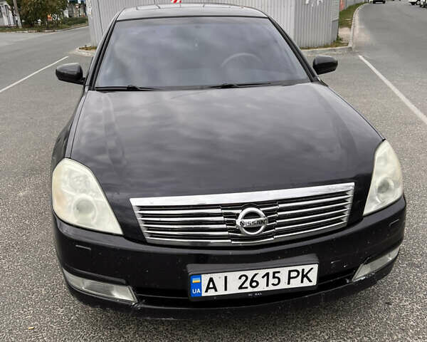 Черный Ниссан Теана, объемом двигателя 2.3 л и пробегом 329 тыс. км за 4600 $, фото 1 на Automoto.ua