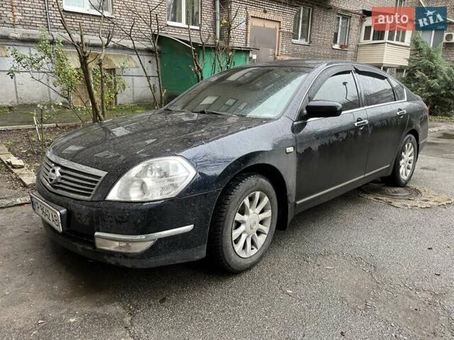 Черный Ниссан Теана, объемом двигателя 2.35 л и пробегом 250 тыс. км за 6100 $, фото 1 на Automoto.ua