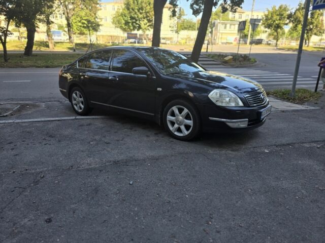 Черный Ниссан Теана, объемом двигателя 3.5 л и пробегом 301 тыс. км за 6900 $, фото 1 на Automoto.ua