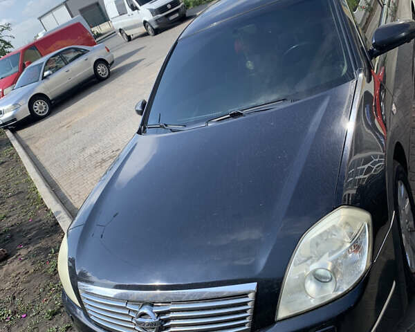 Черный Ниссан Теана, объемом двигателя 2.35 л и пробегом 216 тыс. км за 5000 $, фото 1 на Automoto.ua