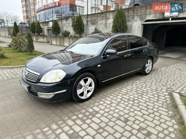 Черный Ниссан Теана, объемом двигателя 3.5 л и пробегом 315 тыс. км за 4500 $, фото 1 на Automoto.ua
