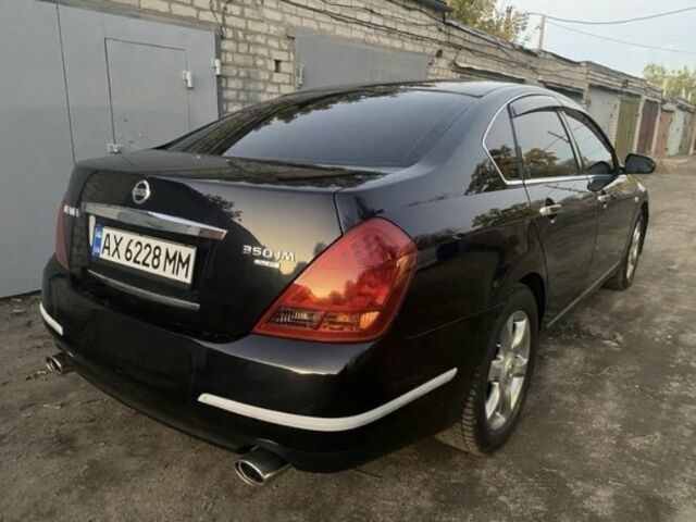 Черный Ниссан Теана, объемом двигателя 3.5 л и пробегом 237 тыс. км за 5650 $, фото 1 на Automoto.ua