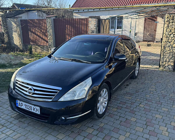 Черный Ниссан Теана, объемом двигателя 3.5 л и пробегом 200 тыс. км за 7500 $, фото 1 на Automoto.ua