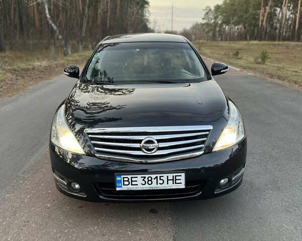 Черный Ниссан Теана, объемом двигателя 2.5 л и пробегом 190 тыс. км за 6900 $, фото 1 на Automoto.ua
