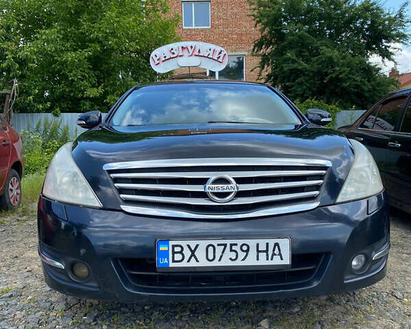 Черный Ниссан Теана, объемом двигателя 2.5 л и пробегом 280 тыс. км за 6100 $, фото 1 на Automoto.ua