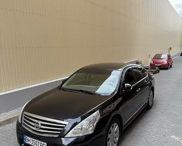 Черный Ниссан Теана, объемом двигателя 2.5 л и пробегом 210 тыс. км за 7400 $, фото 1 на Automoto.ua