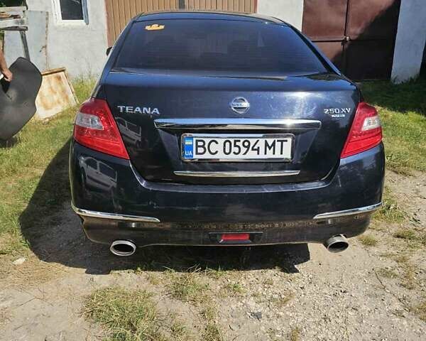 Черный Ниссан Теана, объемом двигателя 2.5 л и пробегом 270 тыс. км за 6000 $, фото 1 на Automoto.ua