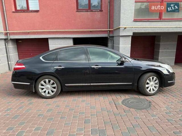 Черный Ниссан Теана, объемом двигателя 2.5 л и пробегом 220 тыс. км за 7300 $, фото 1 на Automoto.ua