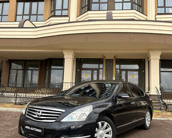 Черный Ниссан Теана, объемом двигателя 2.5 л и пробегом 265 тыс. км за 5990 $, фото 1 на Automoto.ua