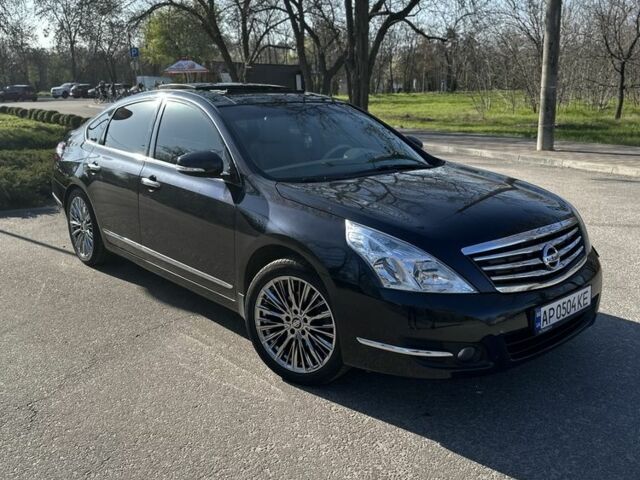Черный Ниссан Теана, объемом двигателя 3.5 л и пробегом 143 тыс. км за 7800 $, фото 1 на Automoto.ua