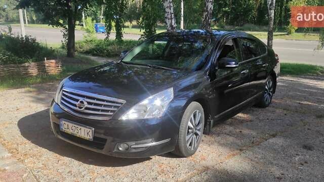 Черный Ниссан Теана, объемом двигателя 3.5 л и пробегом 266 тыс. км за 7500 $, фото 1 на Automoto.ua