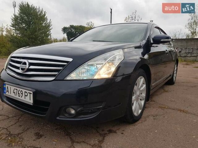 Черный Ниссан Теана, объемом двигателя 2.5 л и пробегом 302 тыс. км за 7250 $, фото 1 на Automoto.ua