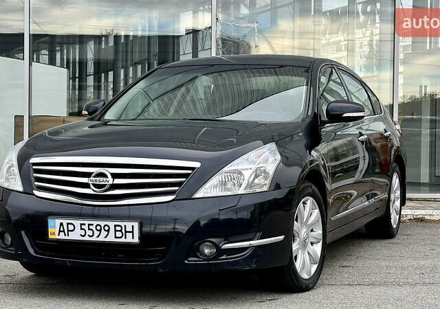 Чорний Ніссан Теана, об'ємом двигуна 2.5 л та пробігом 187 тис. км за 9500 $, фото 1 на Automoto.ua
