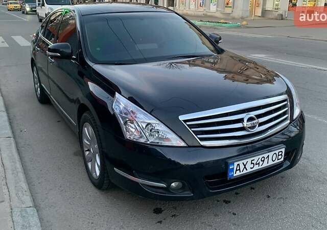Черный Ниссан Теана, объемом двигателя 3.5 л и пробегом 255 тыс. км за 8200 $, фото 1 на Automoto.ua
