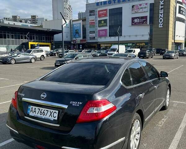 Черный Ниссан Теана, объемом двигателя 2.5 л и пробегом 193 тыс. км за 8500 $, фото 1 на Automoto.ua