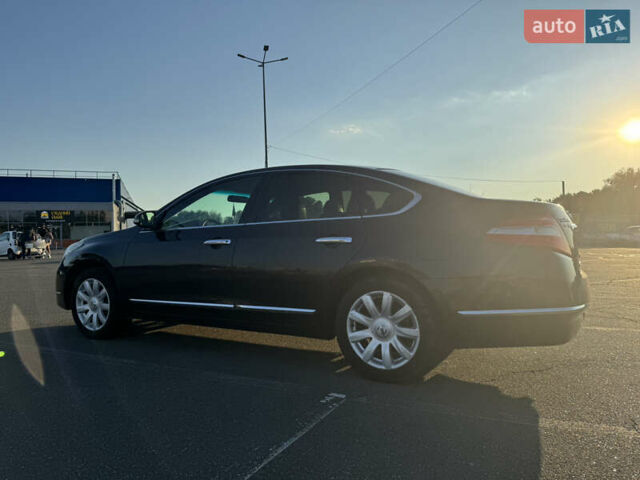 Черный Ниссан Теана, объемом двигателя 2.5 л и пробегом 182 тыс. км за 8500 $, фото 1 на Automoto.ua
