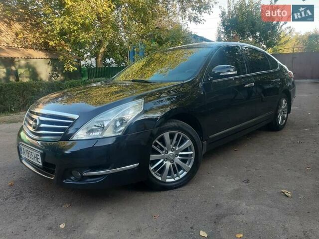 Чорний Ніссан Теана, об'ємом двигуна 2.5 л та пробігом 201 тис. км за 7950 $, фото 1 на Automoto.ua