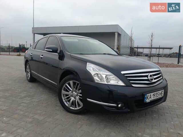 Черный Ниссан Теана, объемом двигателя 2.5 л и пробегом 205 тыс. км за 7950 $, фото 1 на Automoto.ua