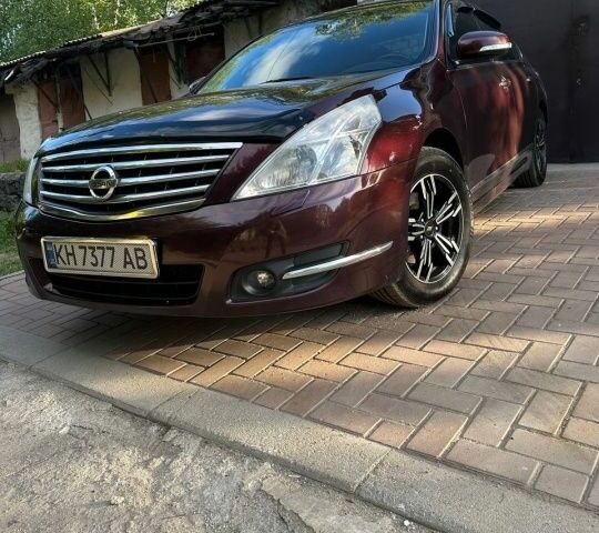 Червоний Ніссан Теана, об'ємом двигуна 2.5 л та пробігом 223 тис. км за 8700 $, фото 1 на Automoto.ua
