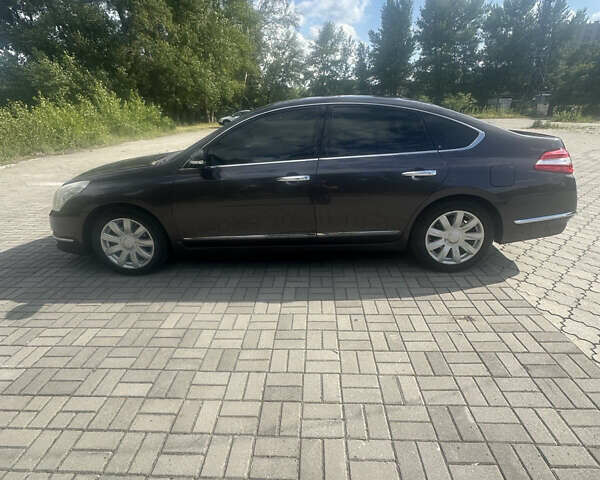 Серый Ниссан Теана, объемом двигателя 3.5 л и пробегом 310 тыс. км за 7000 $, фото 1 на Automoto.ua