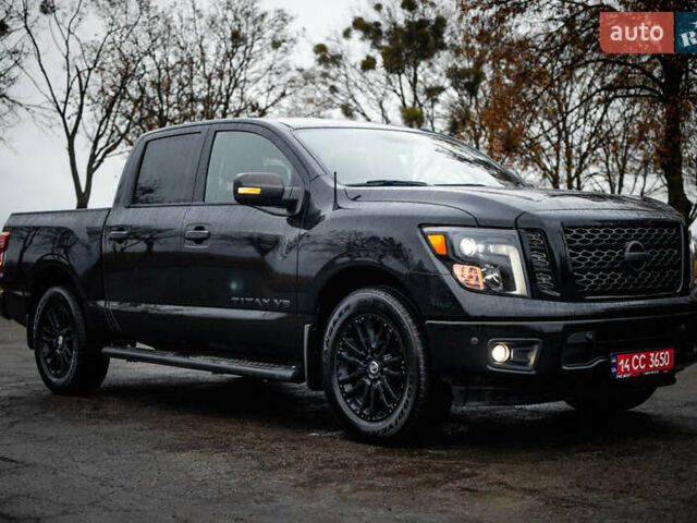 Чорний Ніссан Титан, об'ємом двигуна 5.56 л та пробігом 161 тис. км за 32000 $, фото 1 на Automoto.ua