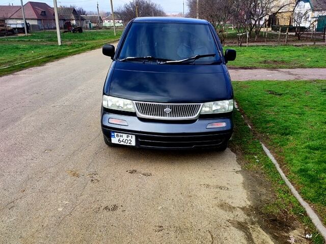 Черный Ниссан Ванетте, объемом двигателя 2 л и пробегом 111 тыс. км за 2200 $, фото 1 на Automoto.ua