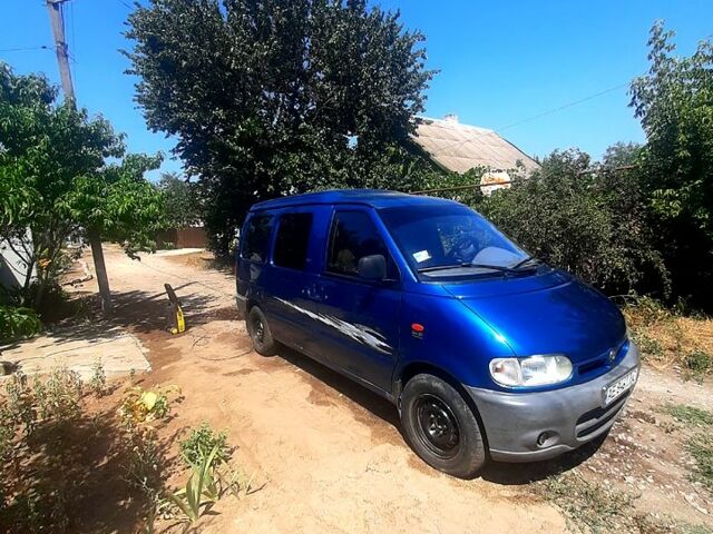 Синий Ниссан Ванетте, объемом двигателя 2.3 л и пробегом 220 тыс. км за 3000 $, фото 1 на Automoto.ua