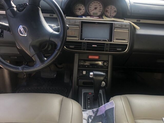 Сірий Ніссан Ікс-Терра, об'ємом двигуна 2.5 л та пробігом 320 тис. км за 4300 $, фото 1 на Automoto.ua