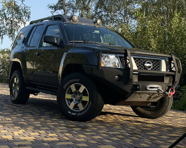 Сірий Ніссан Ікс-Терра, об'ємом двигуна 4 л та пробігом 190 тис. км за 18500 $, фото 1 на Automoto.ua