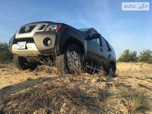 Сірий Ніссан Ікс-Терра, об'ємом двигуна 4 л та пробігом 89 тис. км за 19500 $, фото 1 на Automoto.ua