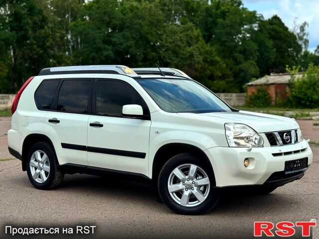 Белый Ниссан ИксТрейл, объемом двигателя 2 л и пробегом 147 тыс. км за 11200 $, фото 1 на Automoto.ua