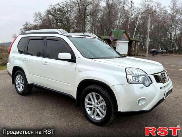 Белый Ниссан ИксТрейл, объемом двигателя 2 л и пробегом 170 тыс. км за 10450 $, фото 1 на Automoto.ua