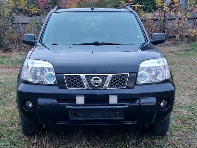 Черный Ниссан ИксТрейл, объемом двигателя 2.2 л и пробегом 260 тыс. км за 3000 $, фото 1 на Automoto.ua