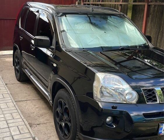 Чорний Ніссан ІксТрейл, об'ємом двигуна 2 л та пробігом 280 тис. км за 9500 $, фото 1 на Automoto.ua