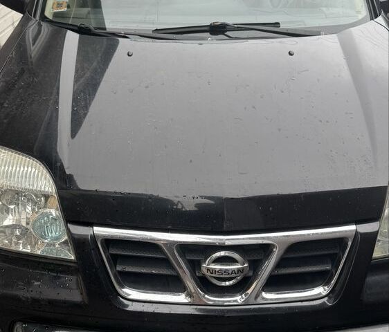 Черный Ниссан ИксТрейл, объемом двигателя 2.2 л и пробегом 385 тыс. км за 2800 $, фото 1 на Automoto.ua