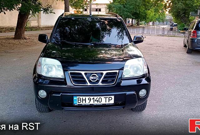 Черный Ниссан ИксТрейл, объемом двигателя 2 л и пробегом 250 тыс. км за 6300 $, фото 1 на Automoto.ua