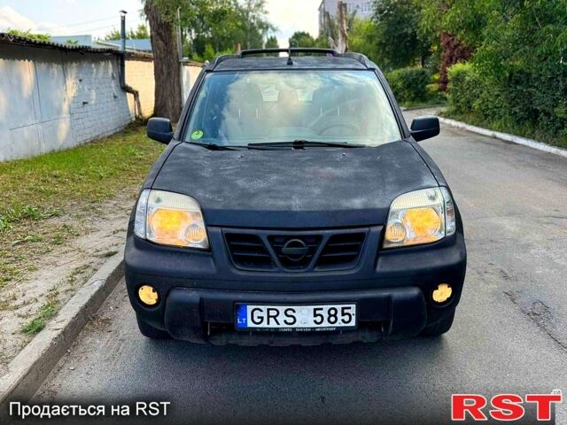 Черный Ниссан ИксТрейл, объемом двигателя 2 л и пробегом 300 тыс. км за 2550 $, фото 1 на Automoto.ua