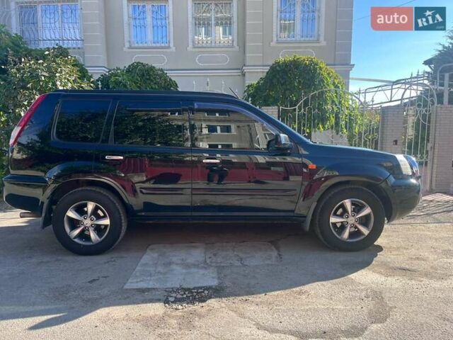 Черный Ниссан ИксТрейл, объемом двигателя 2.49 л и пробегом 176 тыс. км за 7800 $, фото 1 на Automoto.ua