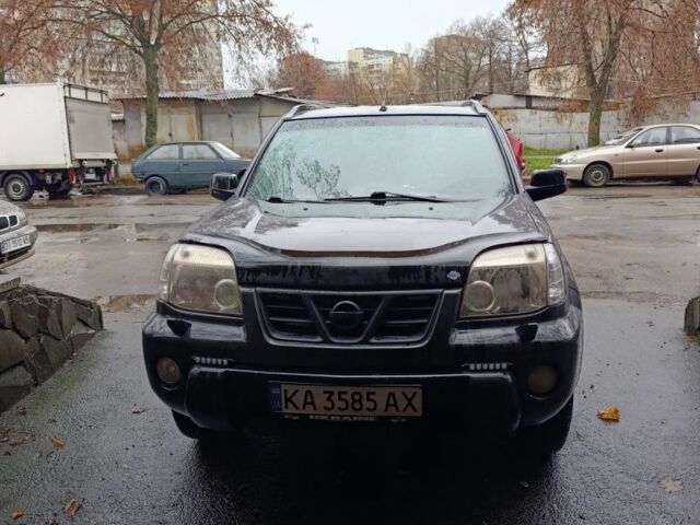 Чорний Ніссан ІксТрейл, об'ємом двигуна 2 л та пробігом 213 тис. км за 7538 $, фото 1 на Automoto.ua