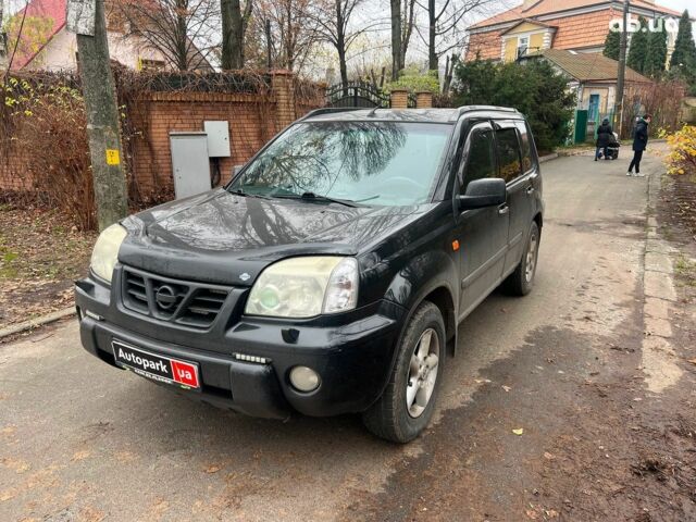 Чорний Ніссан ІксТрейл, об'ємом двигуна 2 л та пробігом 215 тис. км за 6490 $, фото 1 на Automoto.ua