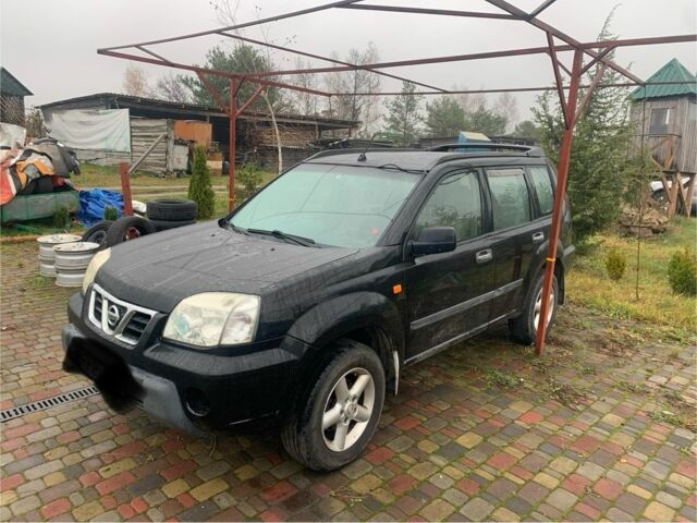 Черный Ниссан ИксТрейл, объемом двигателя 2.2 л и пробегом 370 тыс. км за 2950 $, фото 1 на Automoto.ua